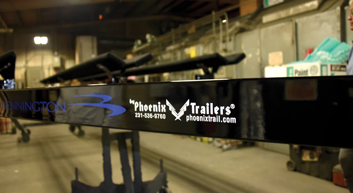 Phoenix Trailers logo on the side of the boat trailer