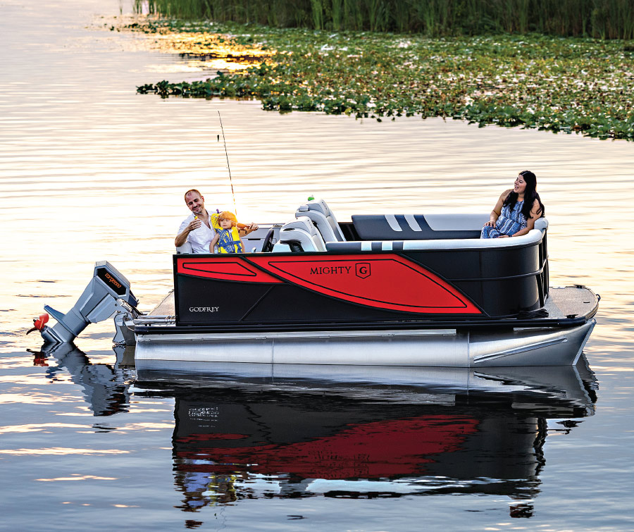 the Mighty G, small 15-foot, 7-inch long pontoon on the water