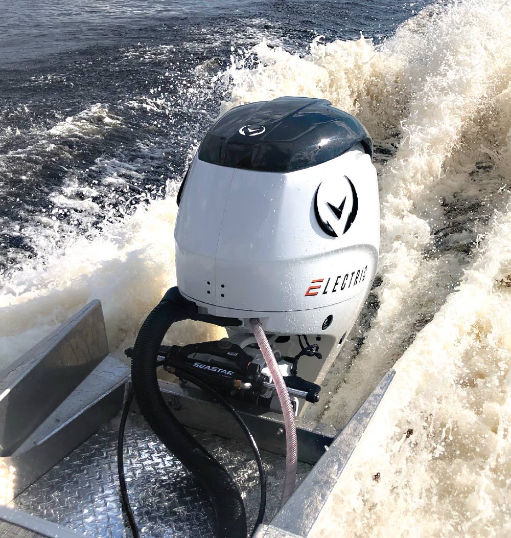 Vision Marine Technologies engine on the back of a boat going through the water