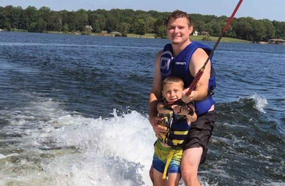Blake Huggins going wakeboarding with his son