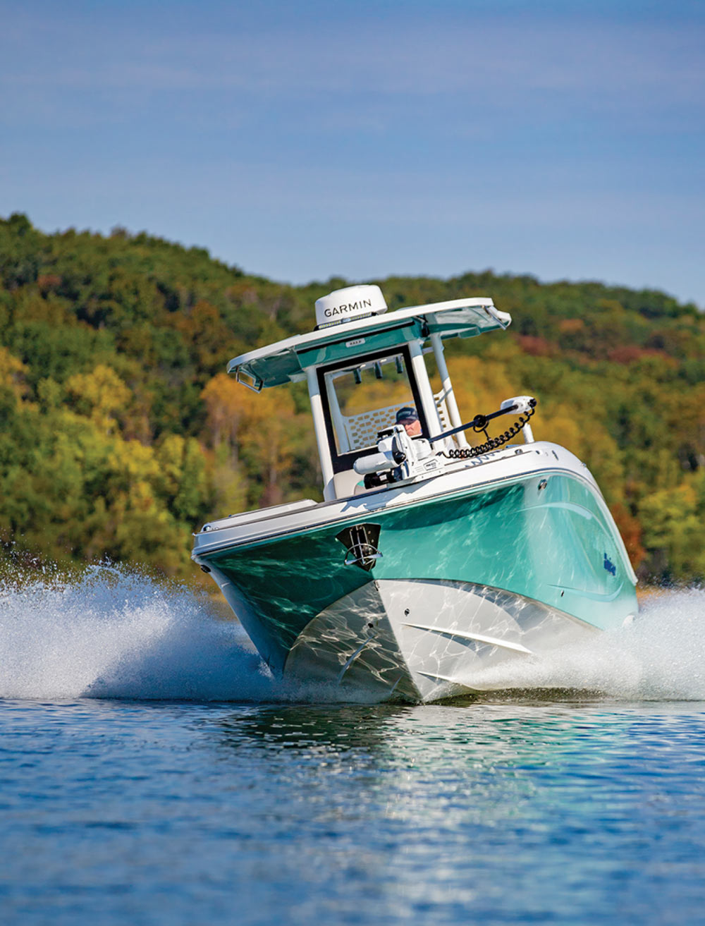 man driving a boat