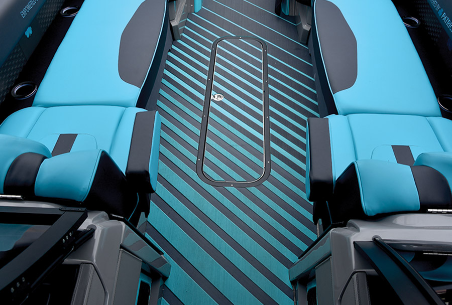 turquoise and blue striped flooring on Patrick Industries pontoon