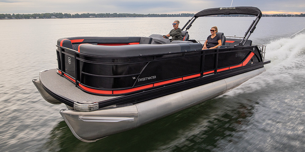 black and red Godfrey SW2286SFLC pontoon in the water