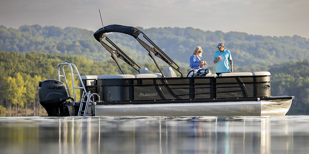 black and white Landau Island Breeze 23 Sport Rear pontoon in the water