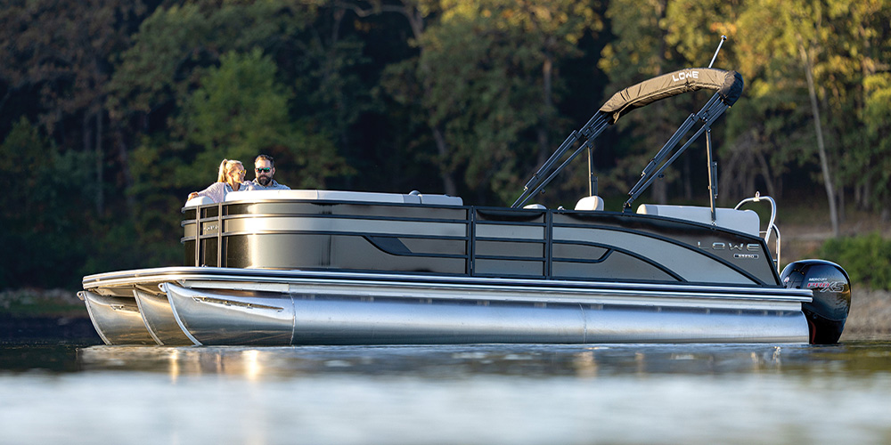 white and silver Lowe SS230 pontoon in the water