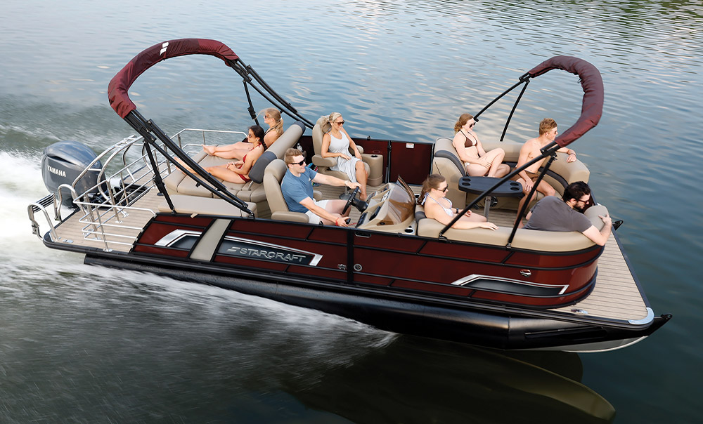 brown and beige Starcraft EXS 3 Q DH pontoon in the water