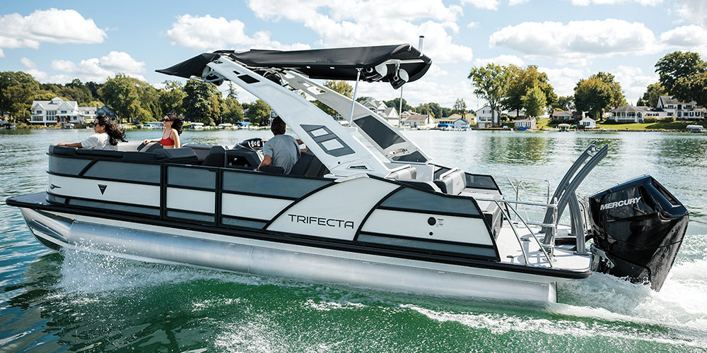 green and white Trifecta 25ULE S pontoon in the water