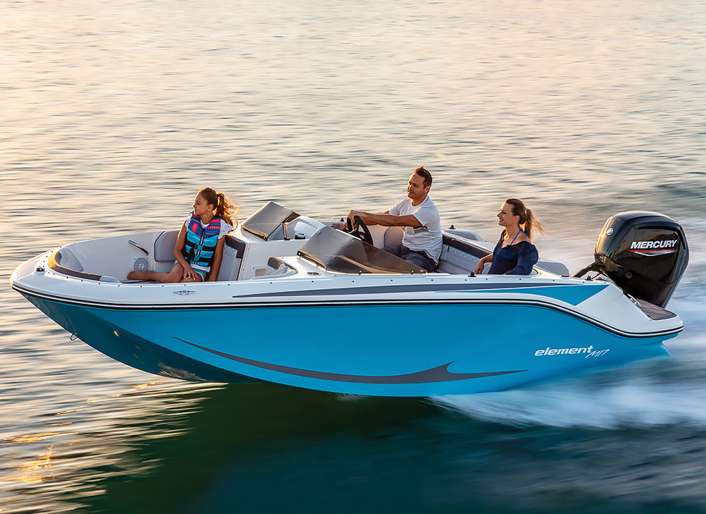 light blue Bayliner M17 boat in the water