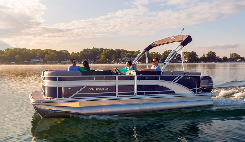 brown and white Bennington 20 SL pontoon in the water