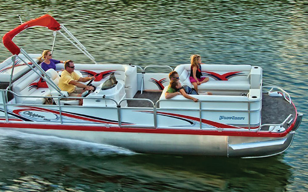 red and white PlayCraft Clipper pontoon in the water