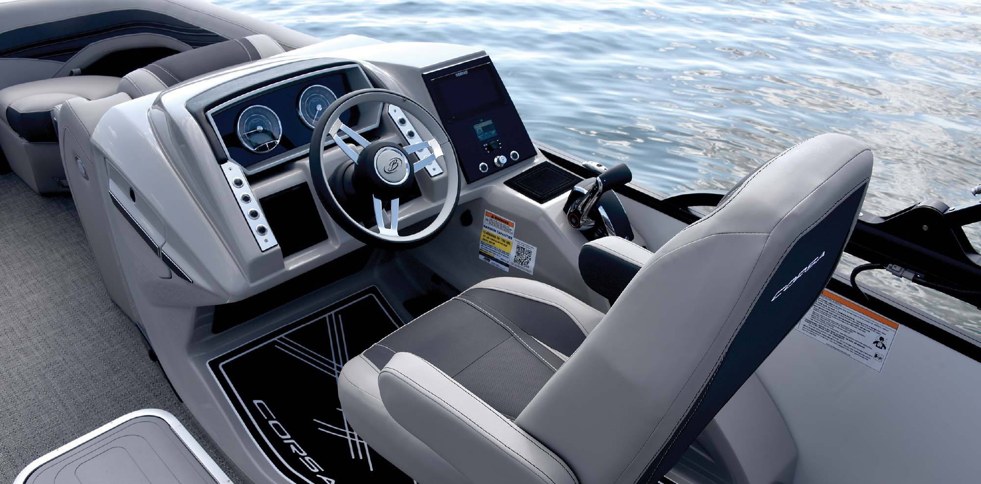driver's seat in Barletta Corsa X23U pontoon