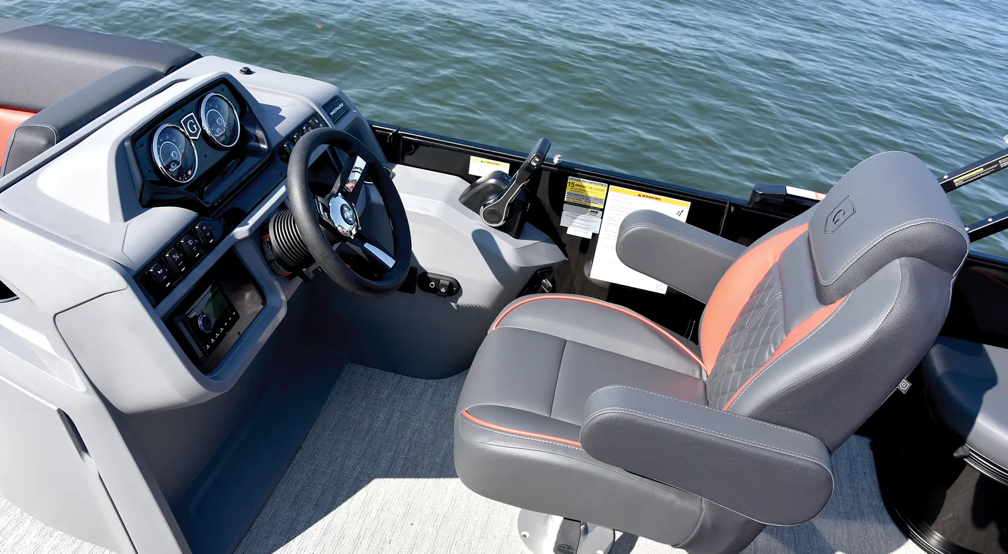 the helm and captains chair of the Godfrey Sweetwater 2486 SFLC