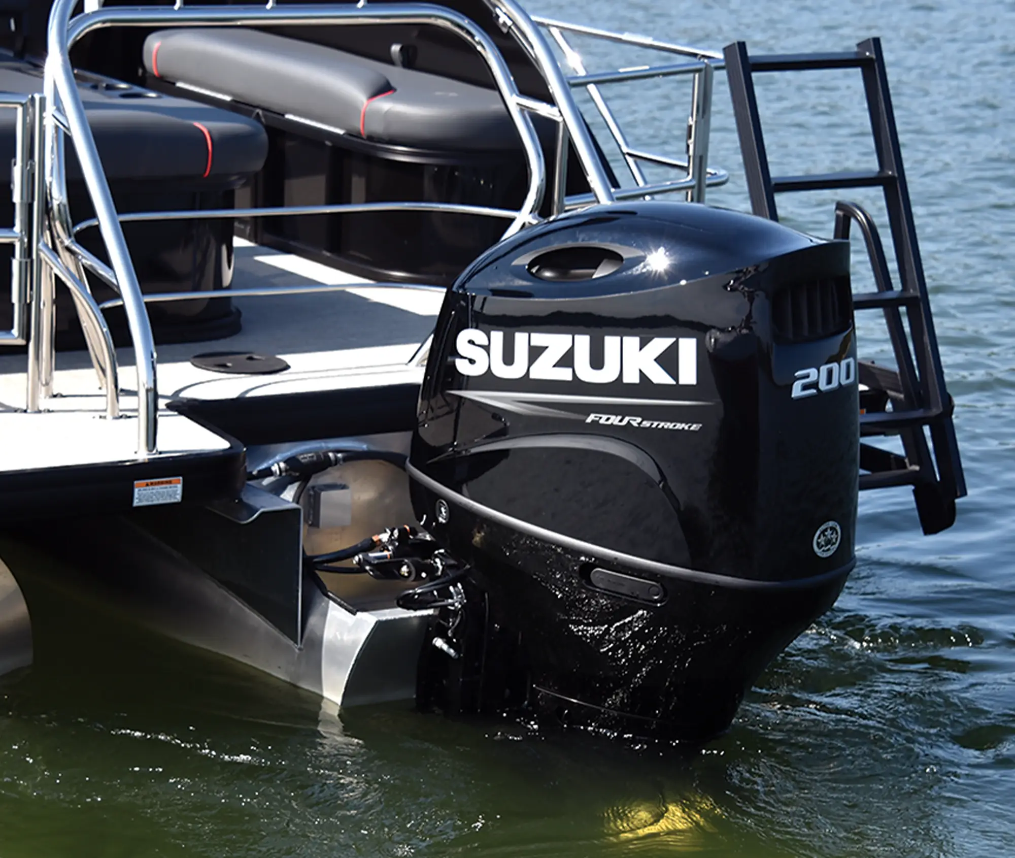 the Suzuki outboard on the Godfrey Sweetwater 2486 SFLC pontoon
