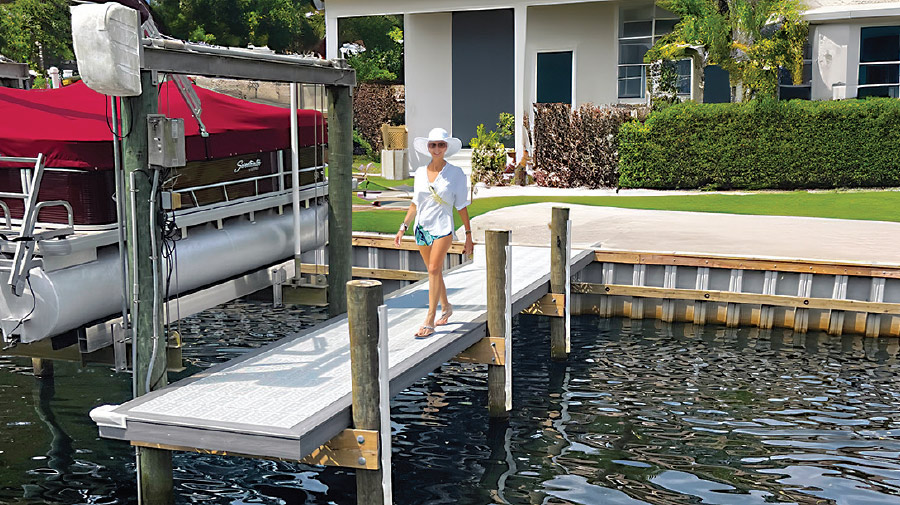 woman walking down coastal dino dock