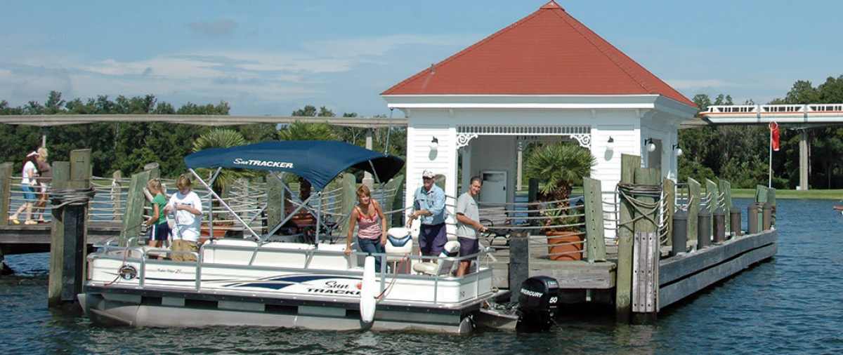 people fishing on docked boat