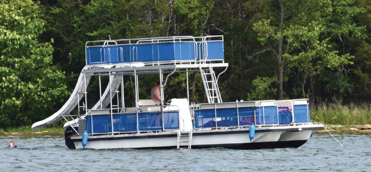 man on blue and white pontoon 