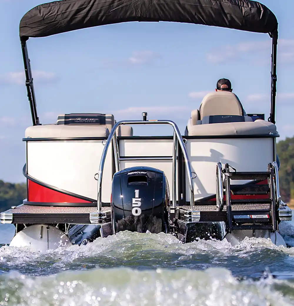rear view of a red and white MY2025 Barletta Cabrio pontoon in the water