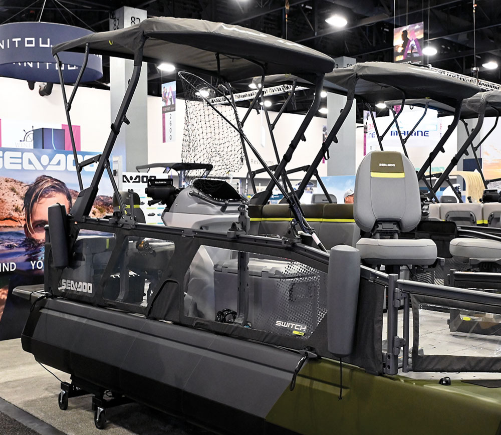 Sea-Doo Switch pontoon boat displayed at an indoor exhibition.