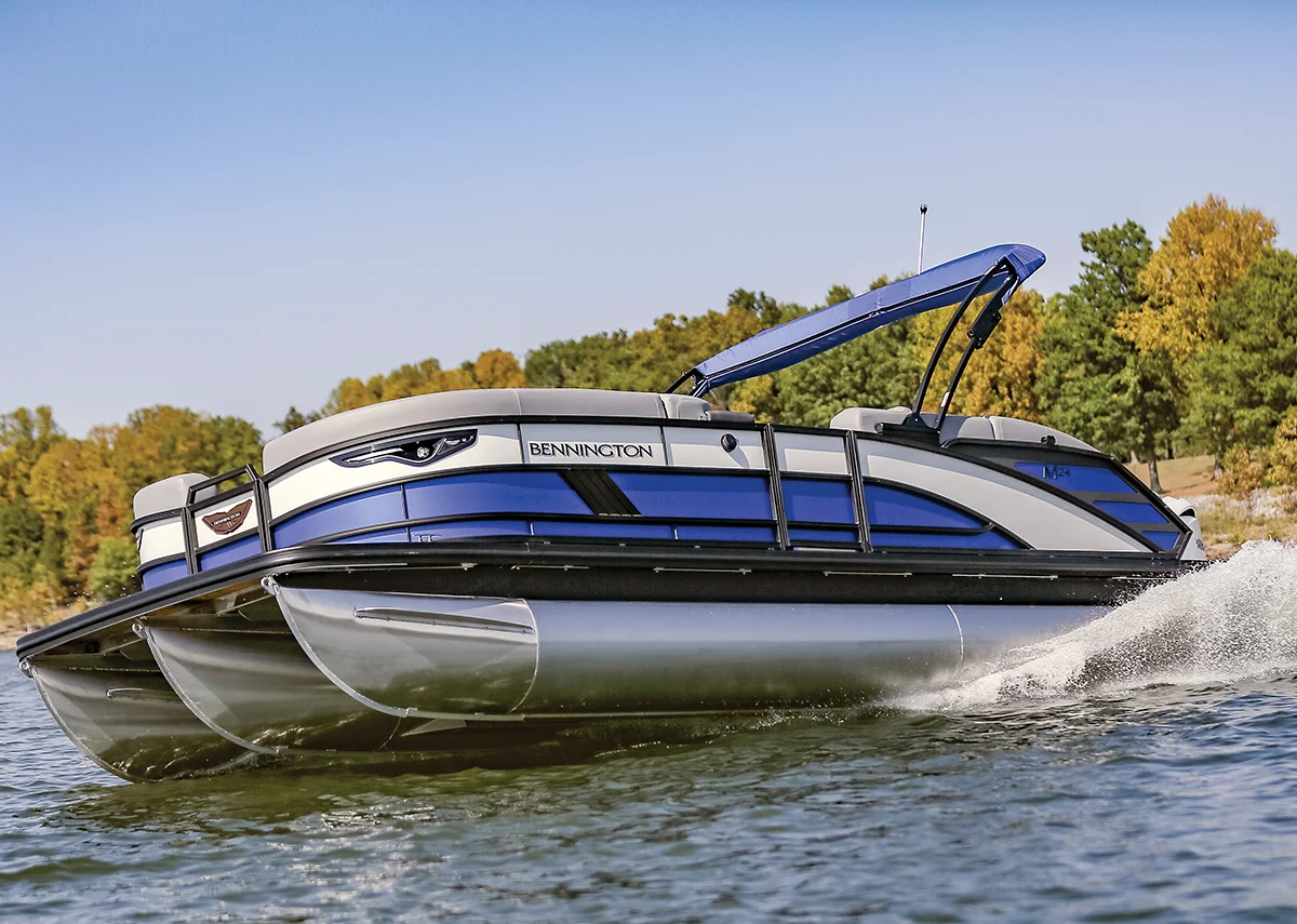 blue and black Bennington pontoon cruising through the water