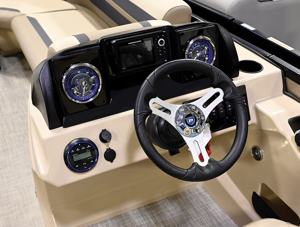 the helm of a beige Premier Sunscape