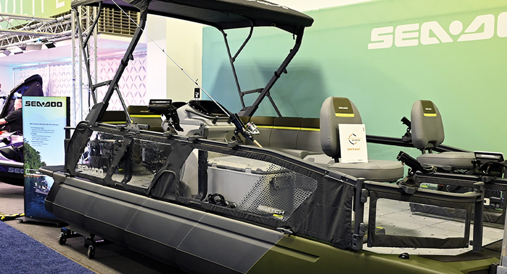 wide view of a Sea-Doo Switch Fish pontoon in black with neon green accents