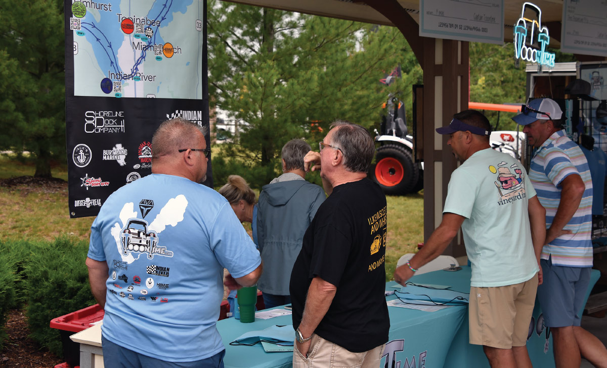 various men at Tooontime booth