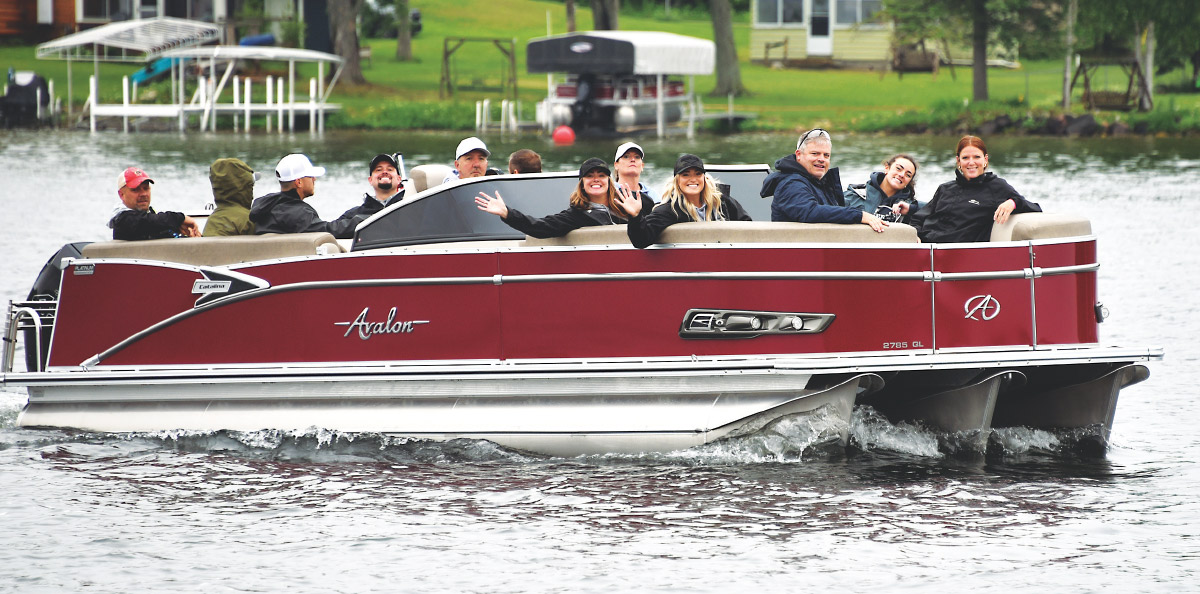 Aralon pontoon filled with people on water