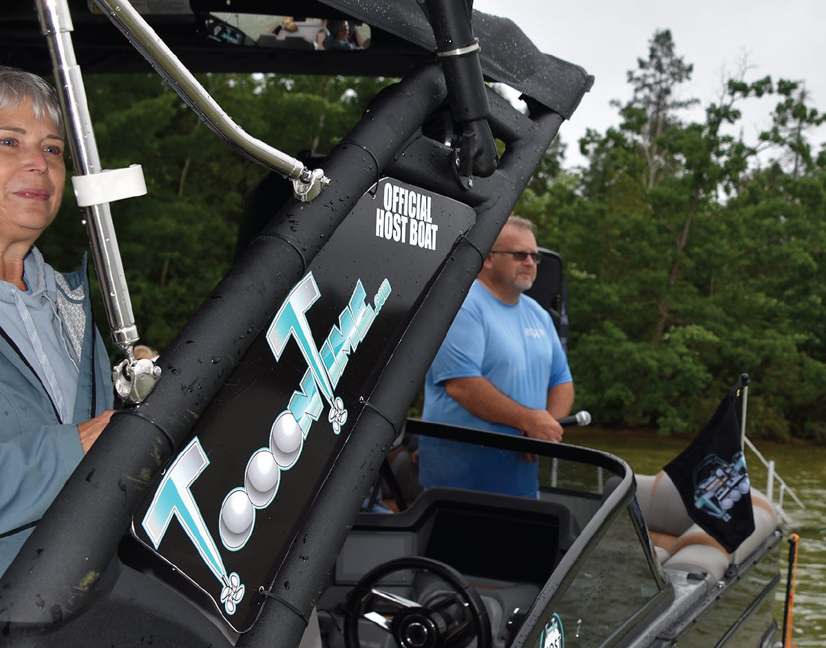 close up of TooonTime logo on side rail of pontoon