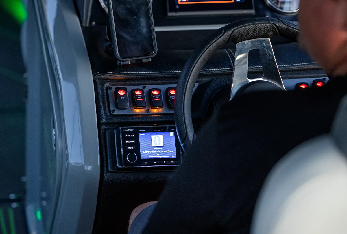 view of steering wheel and dashboard on a pontoon