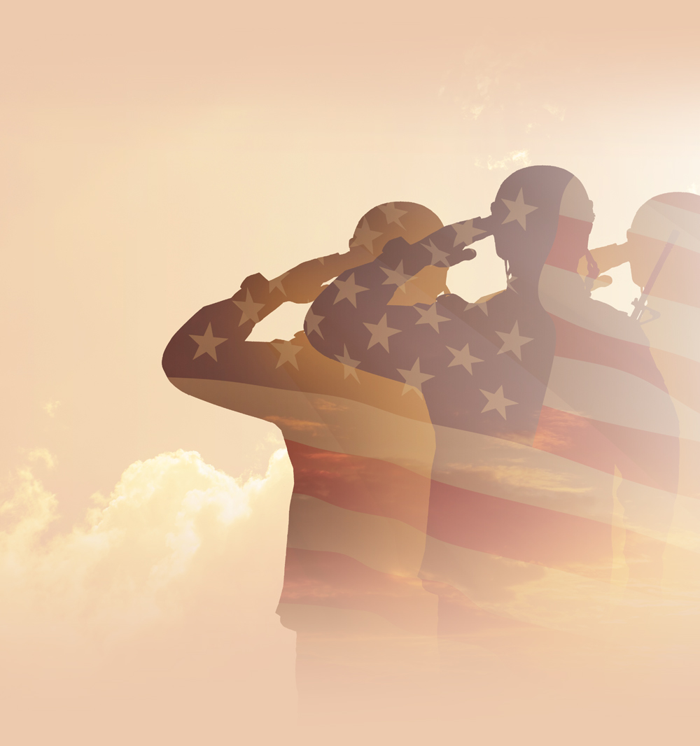 Silhouette of a saluting soldier overlaid with the American flag against a soft sky background.