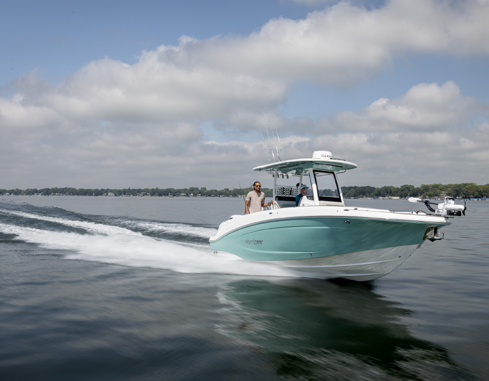 front view of Hurricane 24CC Center Console pontoon being driven through water