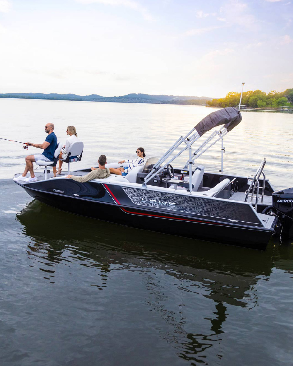 two men and two women lounging in anchored Lowe SD224 pontoon