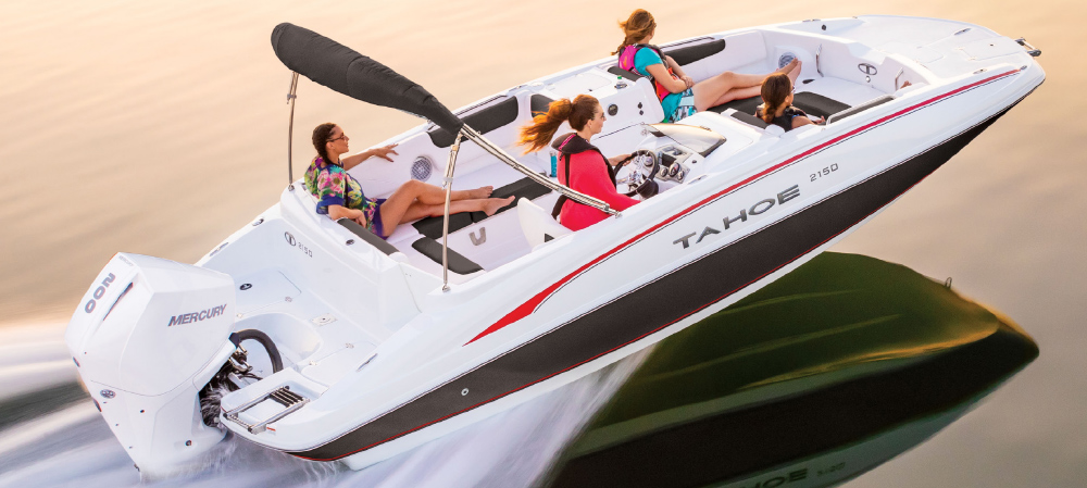 four women riding in TAHOE 2150 pontoon
