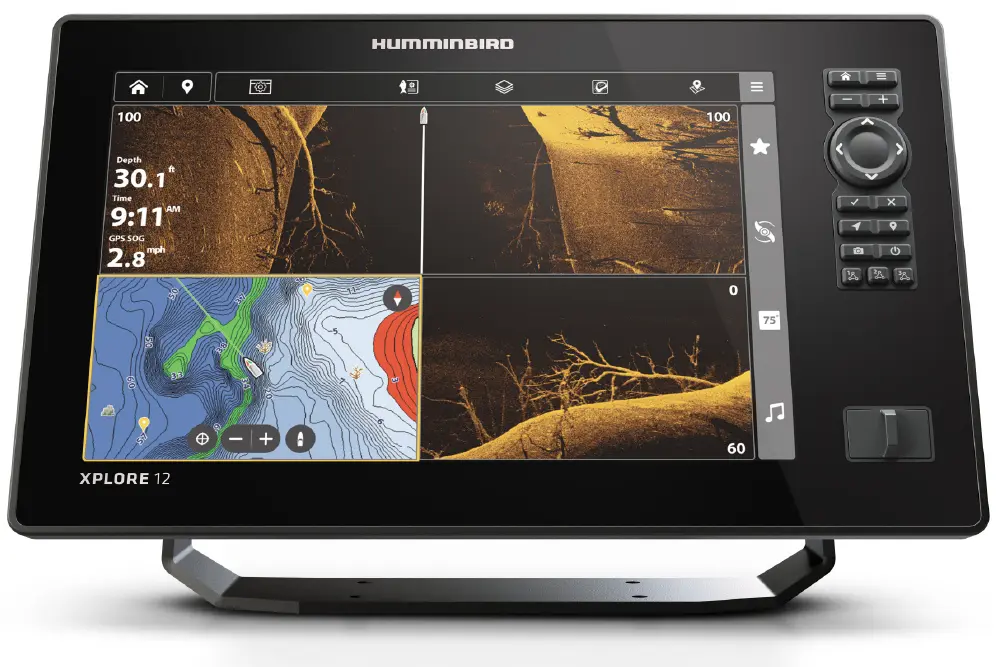 A black digital fishfinder and chartplotter unit, a Humminbird XPLORE 12, is shown with its screen divided into four panels; The screen displays sonar readings in the top two panels and the bottom right, showing underwater terrain and fish; The bottom-left panel displays a detailed topographical map with depth contours, marked with a boat icon; The unit has physical buttons and a control pad on the right side