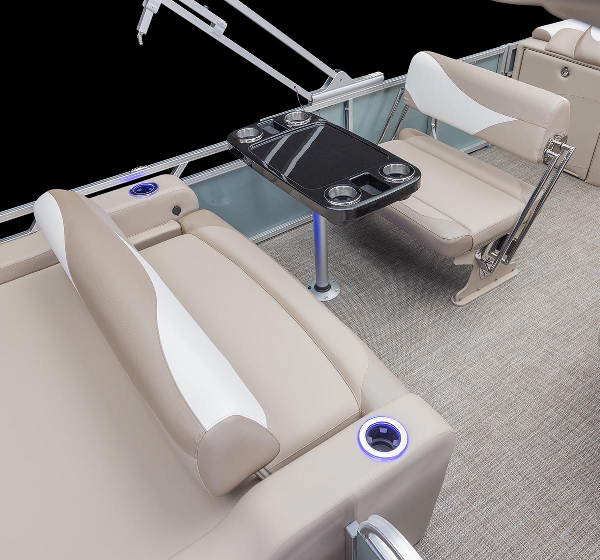 cropped view of at table with bench seating on two sides on the port side of a pontoon