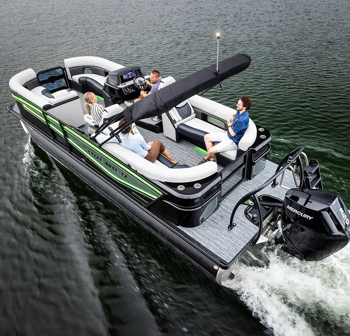 angled aerial view of a black, grey and neon green accented Premier Marine pontoon