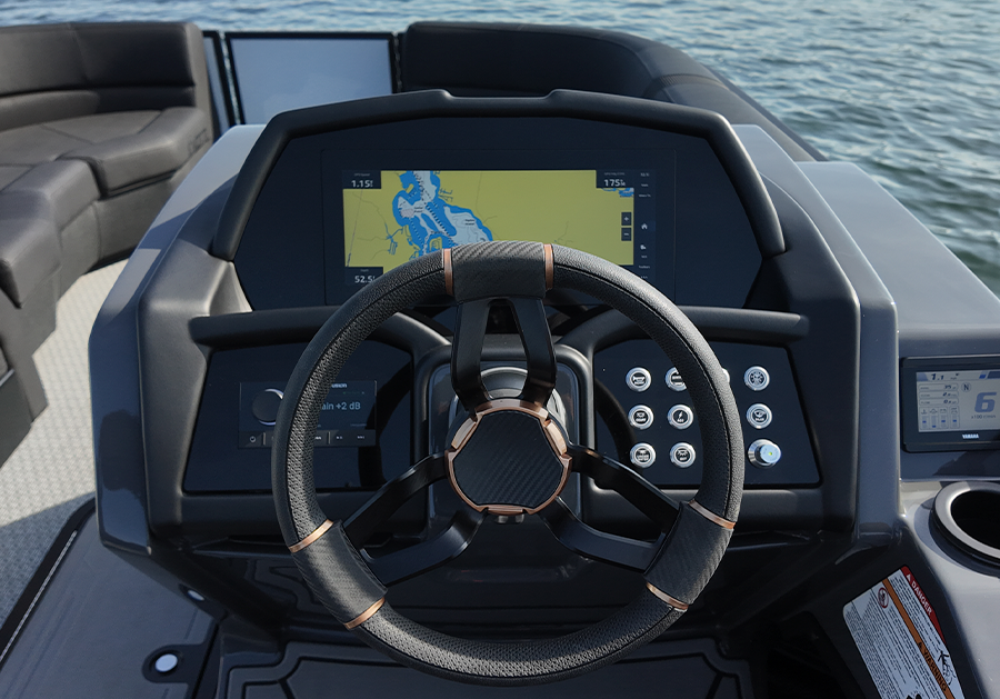 Evotti 723CS pontoon motorboat vehicle's driver's seat wheel, gauge meters, and other button knob controls