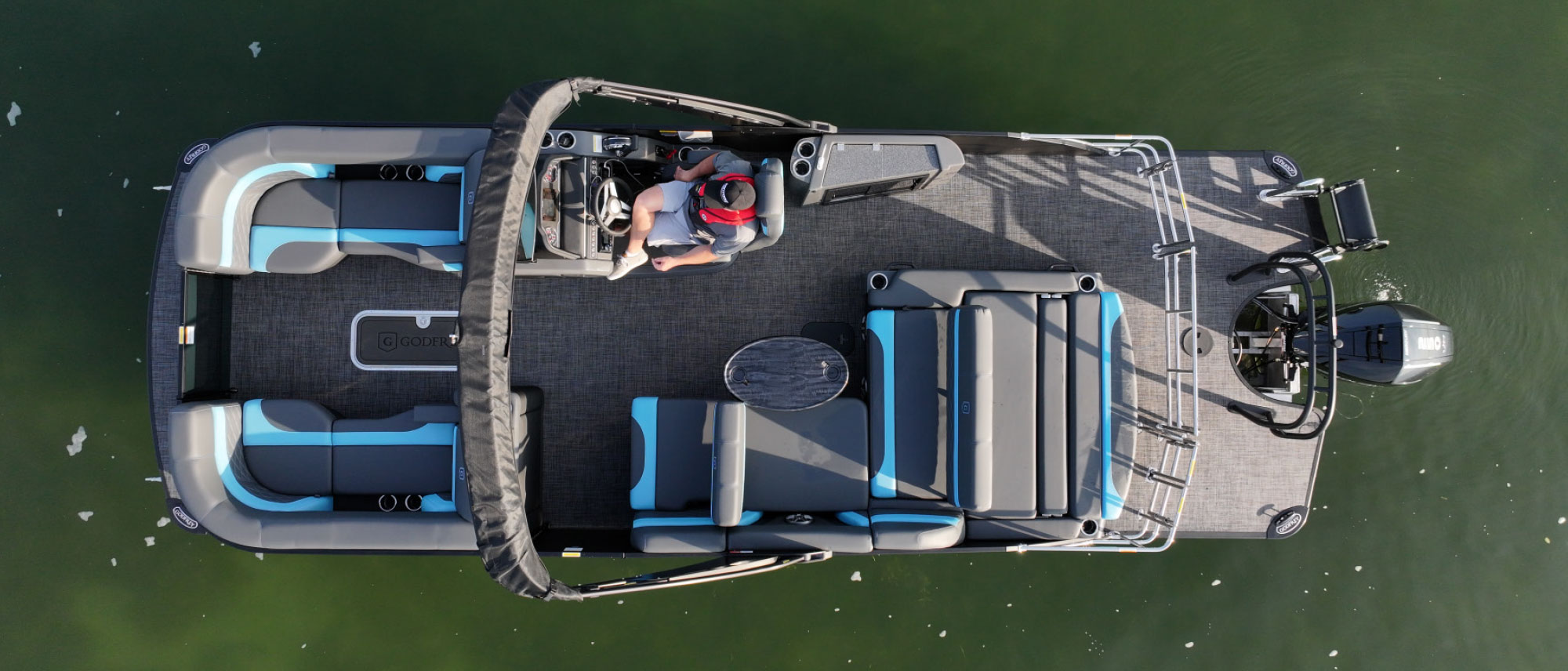 top view of Godfrey Monaco 235 SFL with man in driver's seat