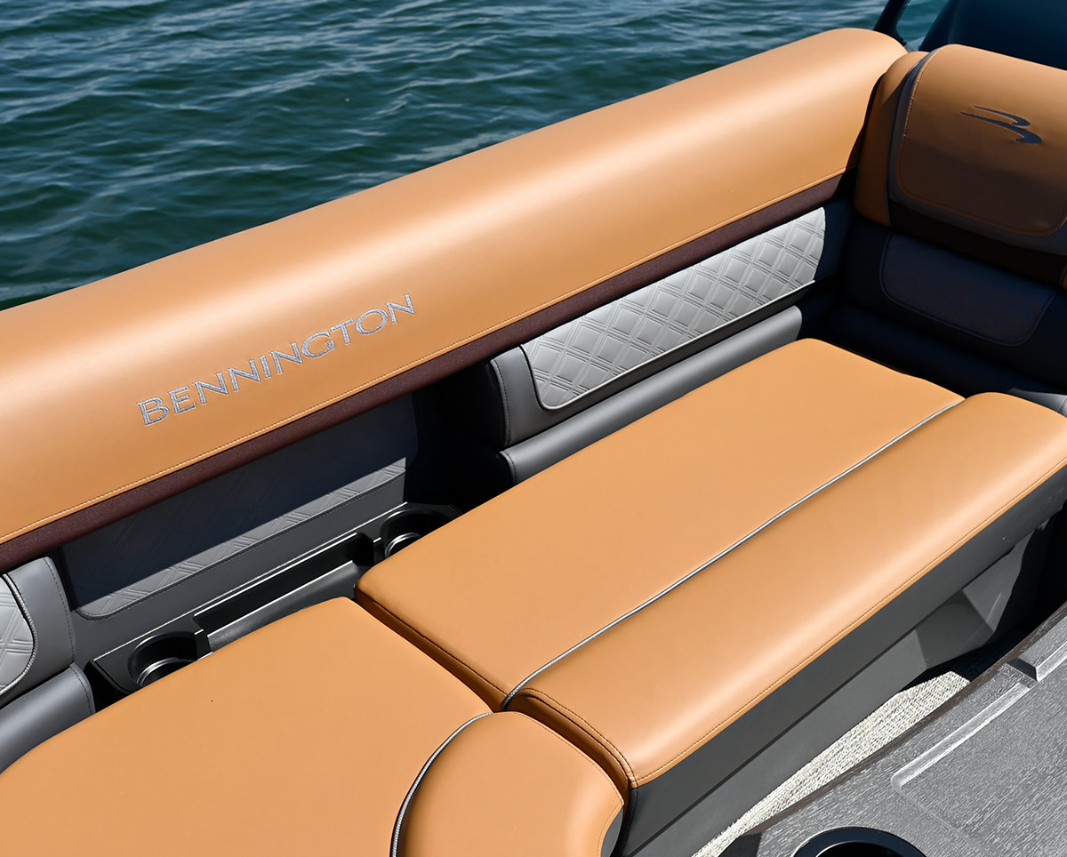 View of tan and gray vinyl upholstery on a Bennington pontoon boat.