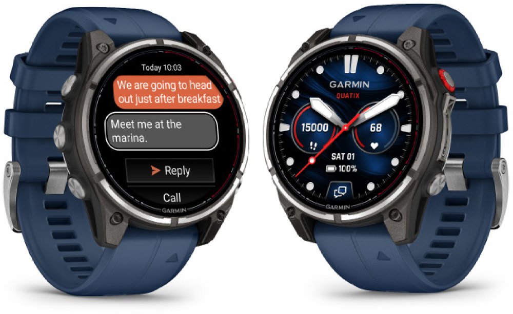 Two Garmin quatix 8 Pro smartwatches with navy blue bands. The left watch displays a text message thread; the right watch shows a nautical analog watch face with status icons for battery, heart rate, and steps.