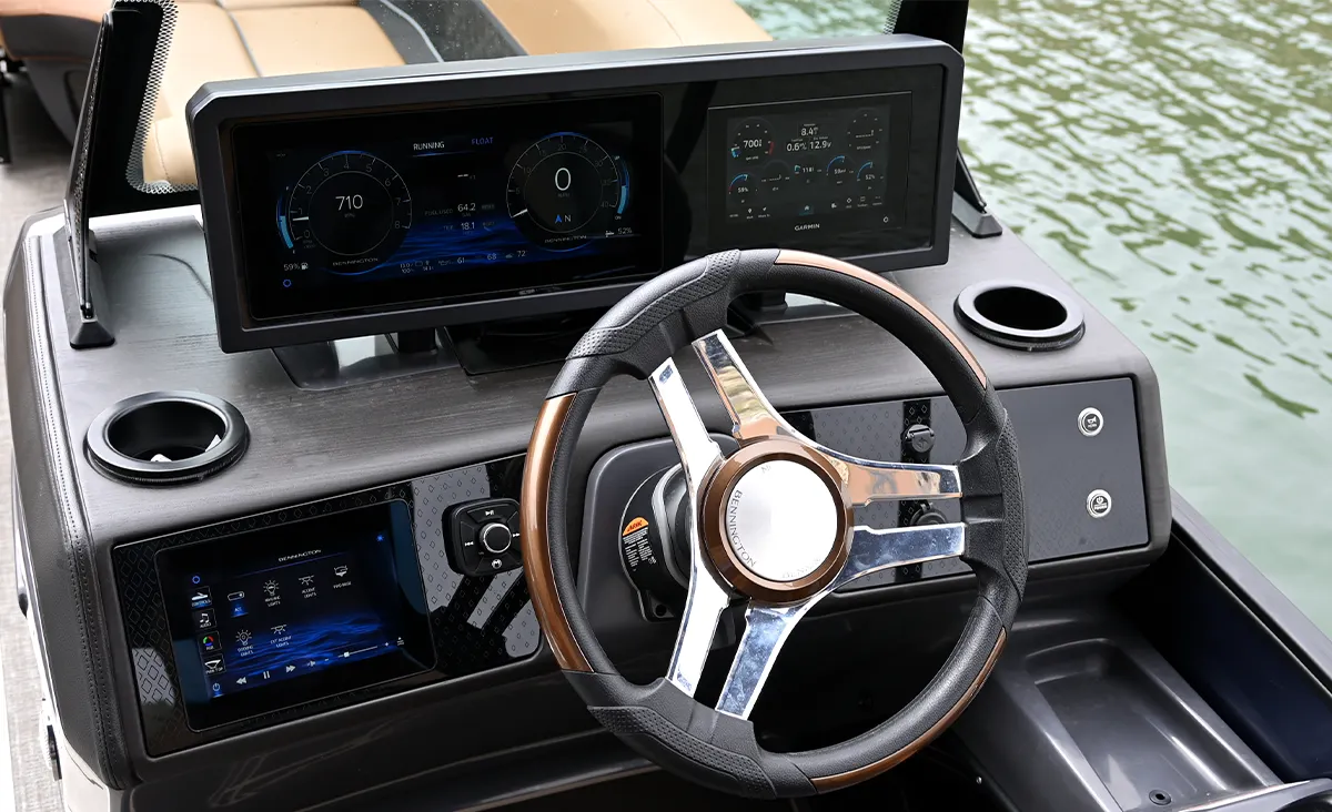 A detailed view of a modern Bennington boat helm station