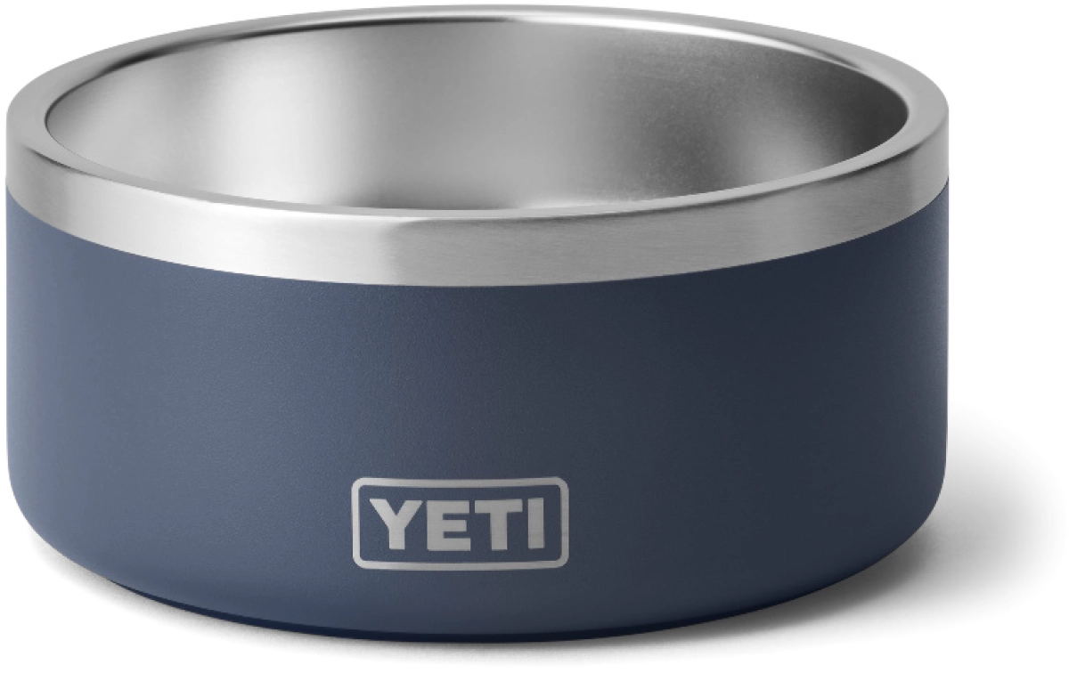 A sturdy, double-walled stainless steel dog bowl from YETI in a navy blue finish with a non-slip base.