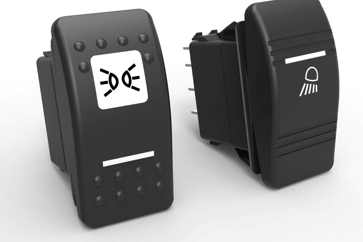 Two black marine rocker switches displayed side by side featuring printed light icons and indicator bars.